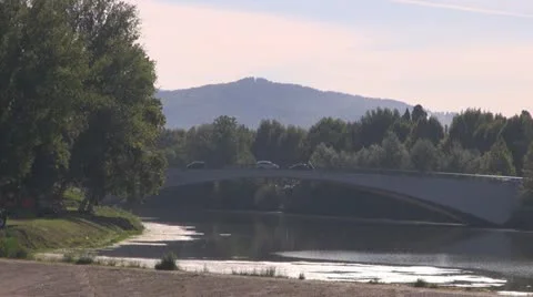 Bridge over river arno.Building is reflected in water.Florence. Stock-Footage 12533973