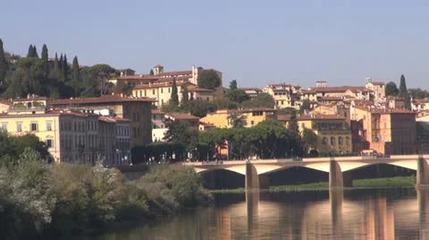 Bridge over river arno.Building is reflected in water.Florence. Stock-Footage 12533982