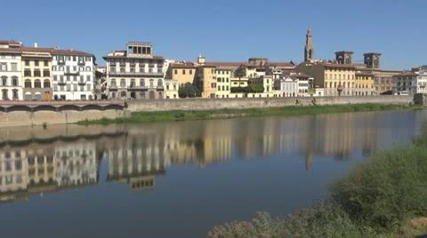 Bridge over river arno.Building is reflected in water.Florence. Stock-Footage 12533985