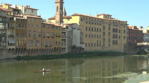 Bridge over river arno.Building is reflected in water.Florence. Stock-Footage 12534471