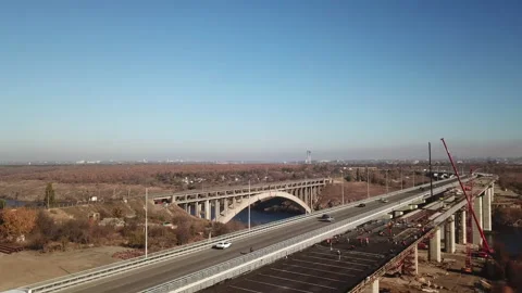 The bridge over the river. Car traffic on the bridge. View from the top. Stock Footage 196391347