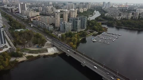 Bridge over the river in the city. high-rise buildings. berth for yachts. drone Video stock 141850591