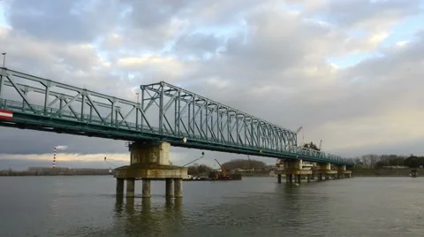 Bridge over the river on a cloudy day - TIME LAPSE HD 1920x1080 30P Video stock 46757212