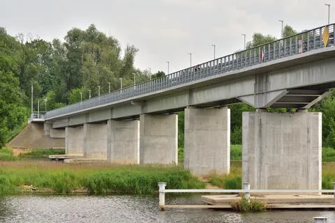 Bridge over the river on a cloudy day. Summer. Day. Stock Photos