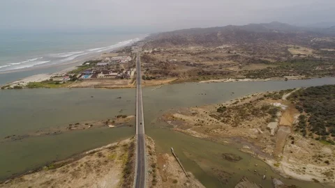 Bridge over a river delta with pacific ocean. Panamericana, Peru Video stock 102631251