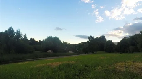 Bridge over a river in evening park timelapse Stock Footage 78017437