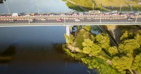 Bridge over the river, with heavy traffic Stock Footage 98647670