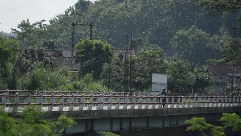 Bridge over the river in the mountains Stock Footage 262293285