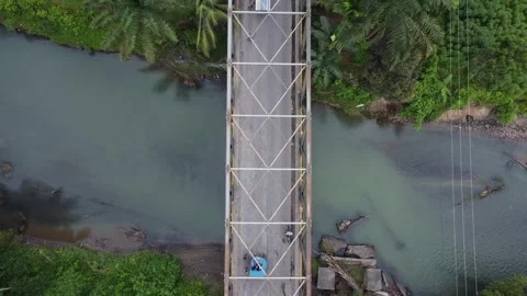 A bridge over a river with a sign on it. Stock Footage 319387014