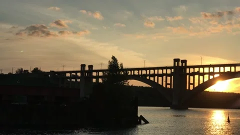 Bridge over the river sunset golden hour Stock Footage 160946202