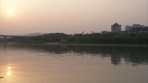 Bridge over the river at sunset in Sichuan, China Stock-Footage 87760848