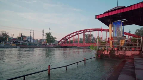 Bridge over river with temple on bank at sunrise city landscape 스톡 동영상 332920867