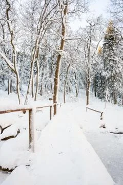 An bridge over the river in the valley Stock Photos