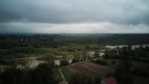 Bridge over the river. Very dirty water in the river after the rains Stock Footage 114651679