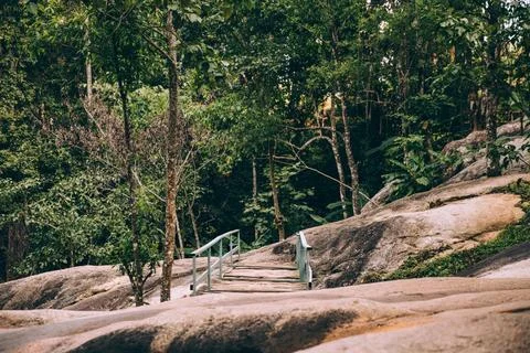 A   bridge   over   rocks Stock Photos