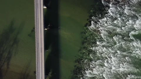 The bridge over rough river with rapids Stock Footage 143361819