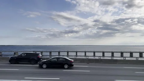 Bridge over Saint Lawrence River in Montreal from moving train Видео 302577270