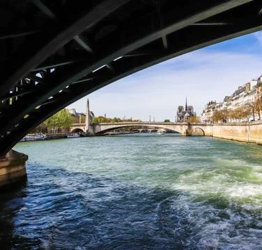 The bridge over Seine river frames Notre Dame Cathedral. Before the fire. Apr Stock Photos