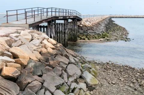 Bridge over shallow waters Stock Photos