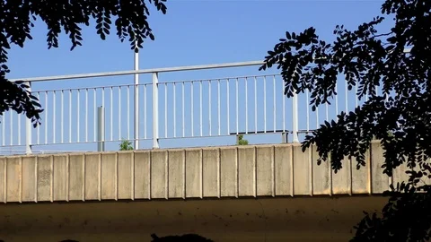 Bridge over a small river and the car on it Видео 73198517