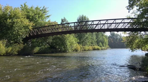 Bridge over a small River Stock Footage 41972546
