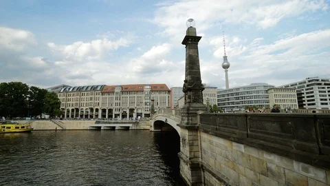 Bridge over Spree river from cathedral building, and Berlin TV tower back side Stock-Footage 127154474