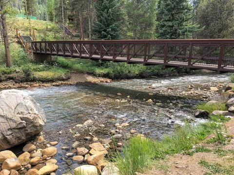Bridge Over Stream Stock Photos