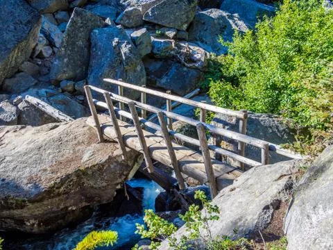 Bridge over the stream on the trail at Alpine Wilderness in North Cascade Mou Stock Photos