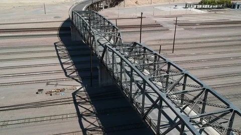 Bridge over train tracks - drone shot Video stock 107879734