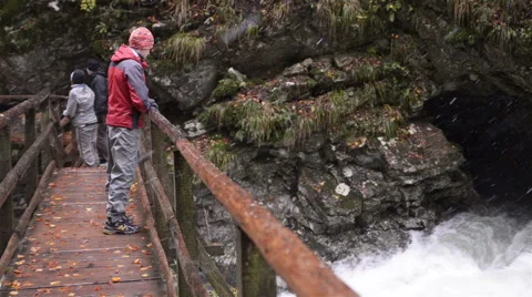 Bridge over waterfall Stock Footage 41252831
