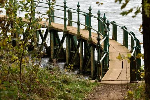 Bridge over the weir Stock Photos
