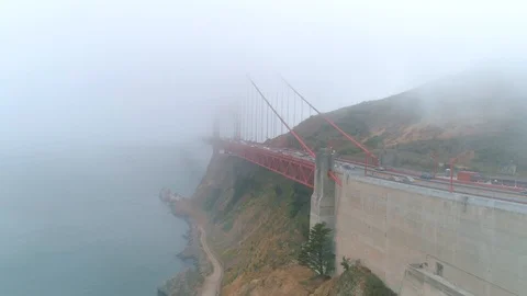 Bridge painted bright red-orange on a foggy day. 스톡 동영상 116753978