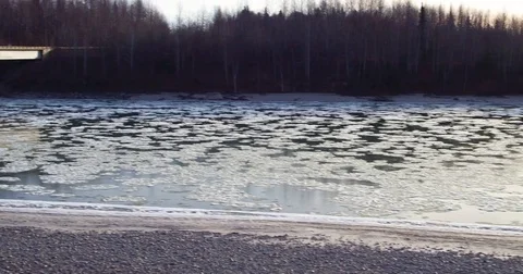 Bridge passing over the frozen river 스톡 동영상 79656501
