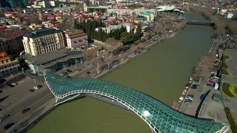 The Bridge of Peace over the Mtkvari River in Tbilisi, Georgia. Stock Footage 332920426