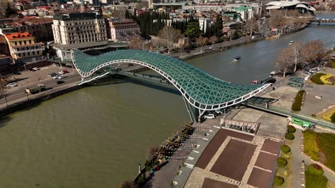 The Bridge of Peace over the Mtkvari River in Tbilisi, Georgia. Stock Footage 332920504