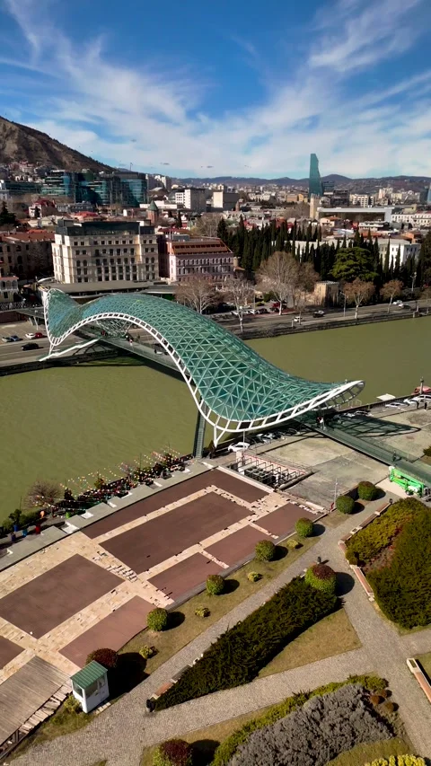 The Bridge of Peace over the Mtkvari River in Tbilisi, Georgia. Stock Footage 332920549