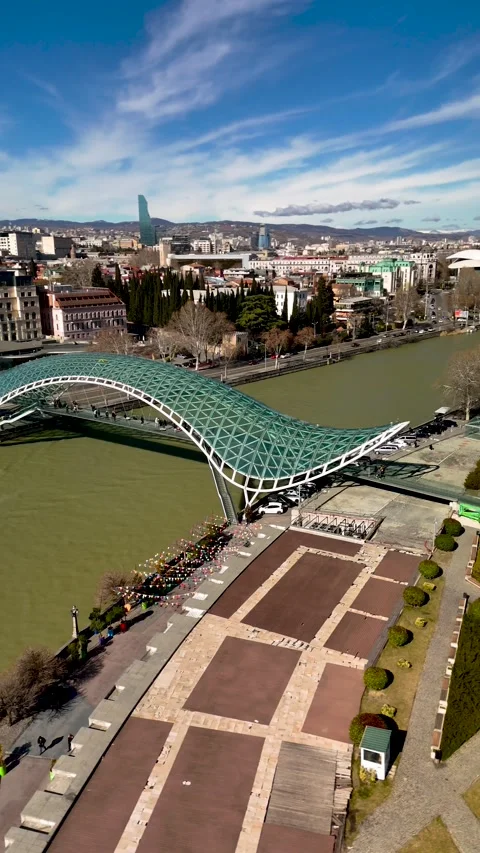 The Bridge of Peace over the Mtkvari River in Tbilisi, Georgia. Stock Footage 332920609