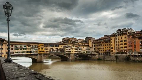 Bridge Ponte Vecchio in Florence on a cloudy day in autumn Stock Photos