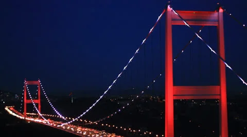 Bridge with red lights at dark blue sky Stock Footage