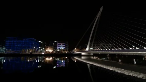 Bridge reflected in water at night, Dublin Stock Footage 99339731