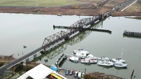 Bridge reflection on calm river Stock Photos