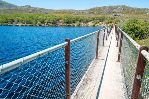 Bridge on the reservoir Stock Photos