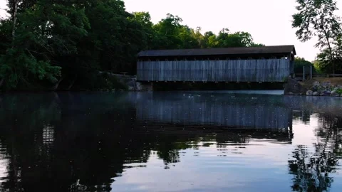 A bridge on a river in Michigan Stock Footage 137334394