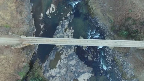 Bridge with river underneath Stock Footage 136233974