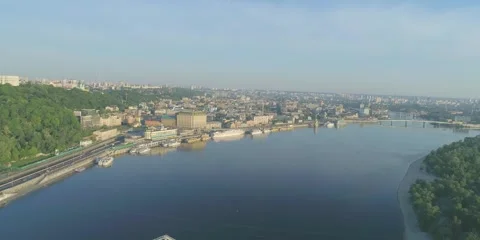 Bridge road crossing river, riverfront and riverbank, sunlight summer landscape Stock Footage 270478675