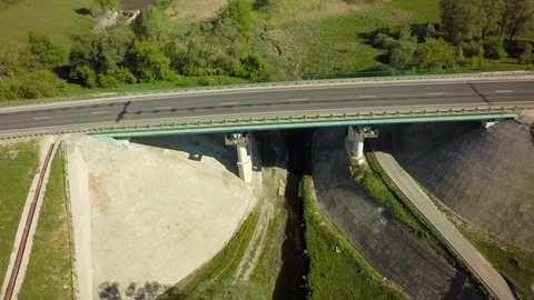 Bridge, road junction, freight transport on the road, summer day, aerial 스톡 동영상 89656857