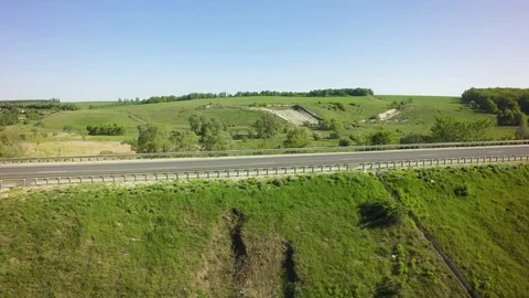 Bridge, road junction, freight transport on the road, summer day, aerial Video stock 89657010