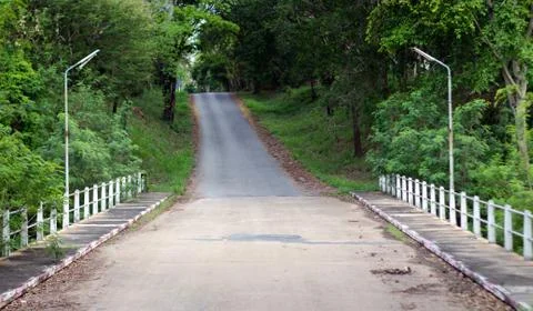 Bridge road to mountain background Stock Photos