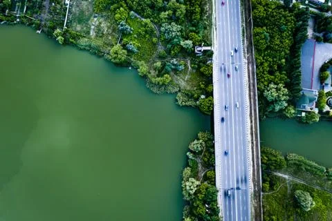 Bridge with road over the river Stock Photos