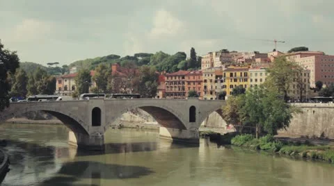 Bridge in rome with traffic and river Stock Footage 10880786